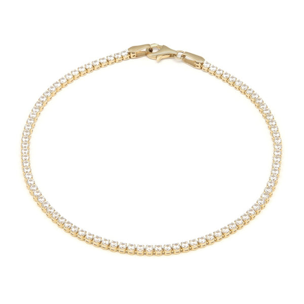 Pulsera eslabón articulado con circonias en oro amarillo 14 kilates.