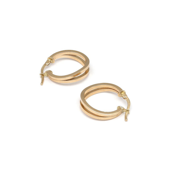 Arracadas dos hilos lisas huecas en oro amarillo 14 kilates.