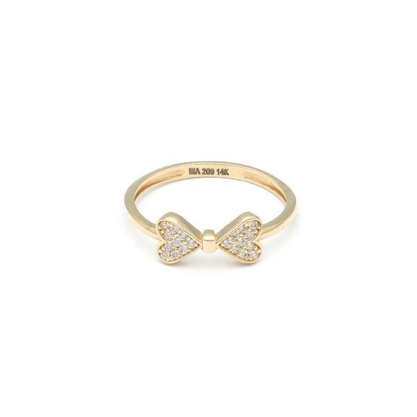 Anillo diseño especial motivo moño con circonias en oro amarillo 14 kilates.