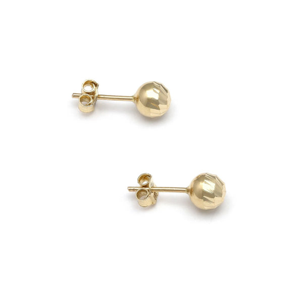 Aretes facetados en oro amarillo 14 kilates.