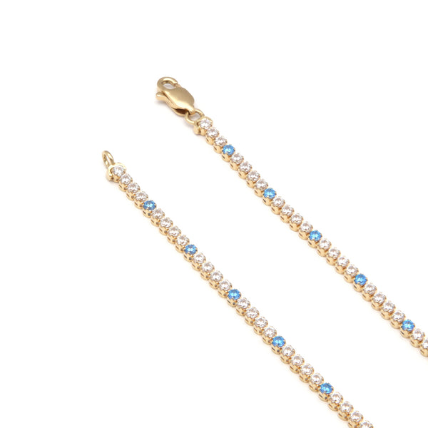Pulsera eslabón articulado con sintéticos en oro amarillo 14 kilates.