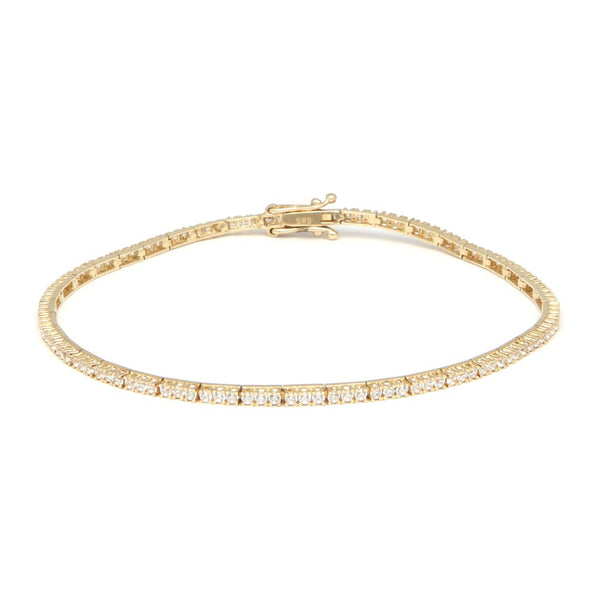 Pulsera eslabón articulado con circonias en oro amarillo 14 kilates.
