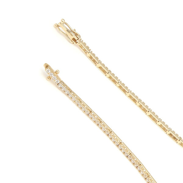 Pulsera eslabón articulado con circonias en oro amarillo 14 kilates.