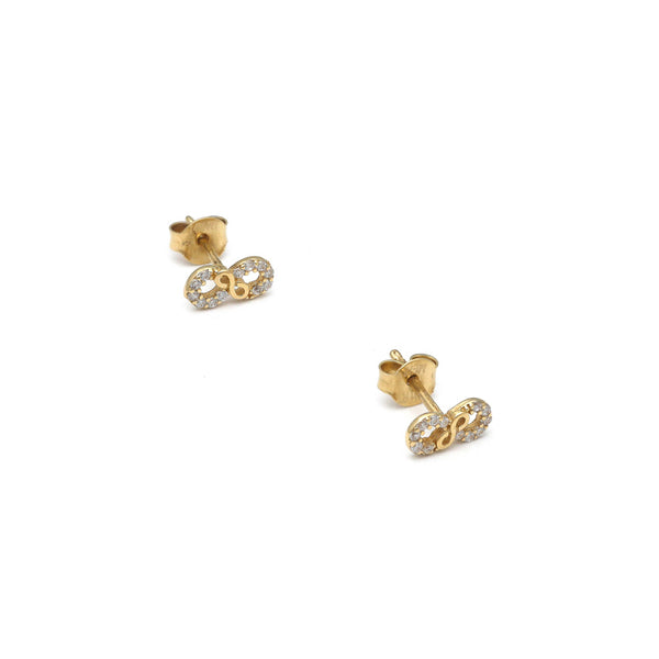 Aretes diseño especial motivo infinito con circonias en oro amarillo 14 kilates.