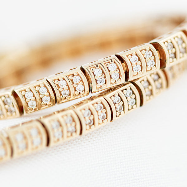 Pulsera eslabón articulado con circonias en oro amarillo 14 kilates.