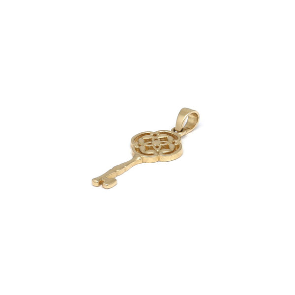 Dije diseño especial motivo llave en oro amarillo 14 kilates.