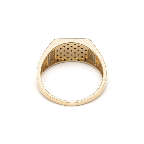 Anillo tipo sello con circonias en oro amarillo 14 kilates.