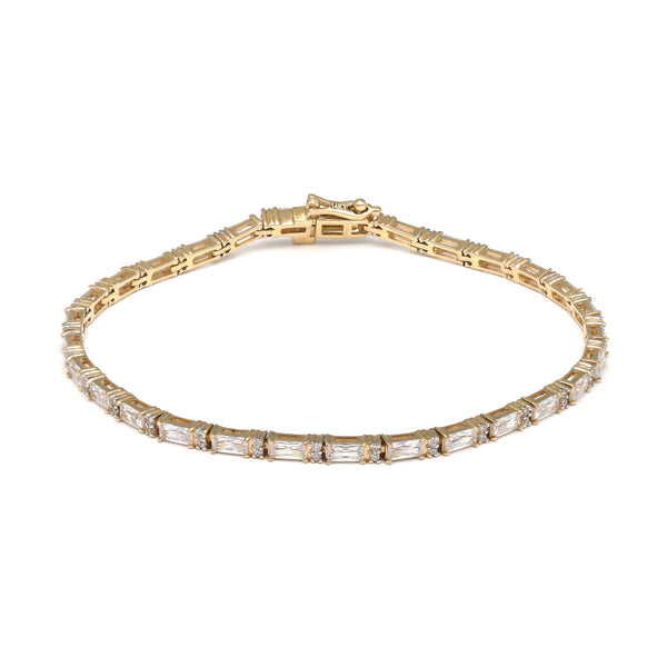 Pulsera eslabón articulado con circonias en oro amarillo 14 kilates.