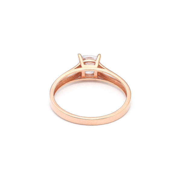 Anillo de compromiso con sintético en oro rosa 14 kilates.