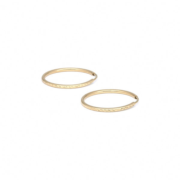 Arracadas tubulares en oro amarillo 14 kilates.