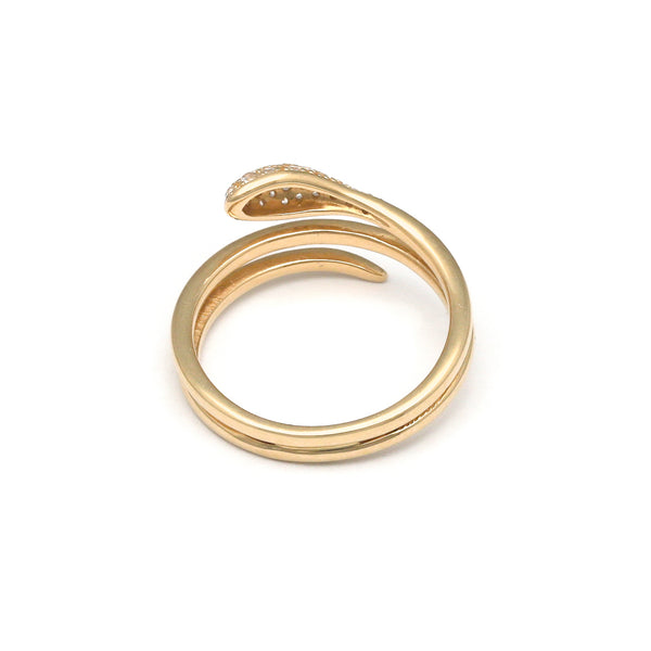 Anillo diseño especial motivo serpiente con circonias en oro amarillo 14 kilates.