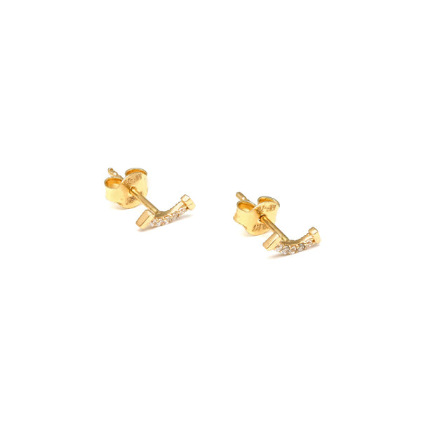 Aretes estilizados con circonias en oro amarillo 14 kilates.
