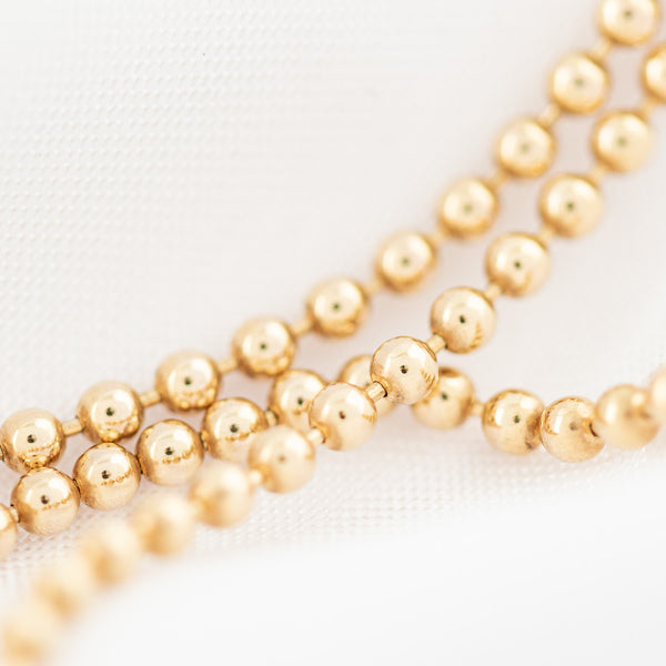 Collar eslabón boleado en oro amarillo 14 kilates.