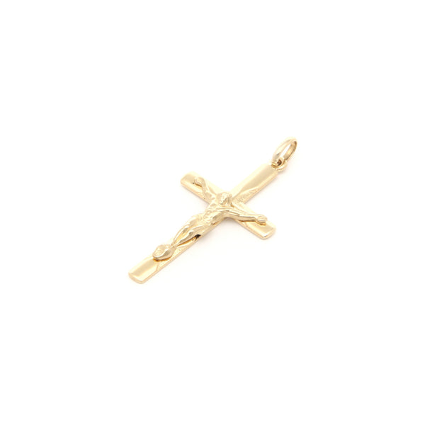 Crucifijo liso en oro amarillo 14 kilates.