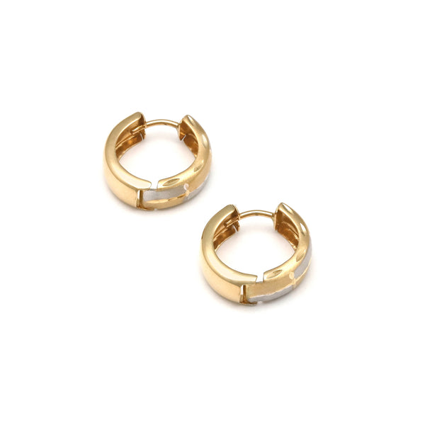 Arracadas articuladas en oro amarillo 14 kilates.