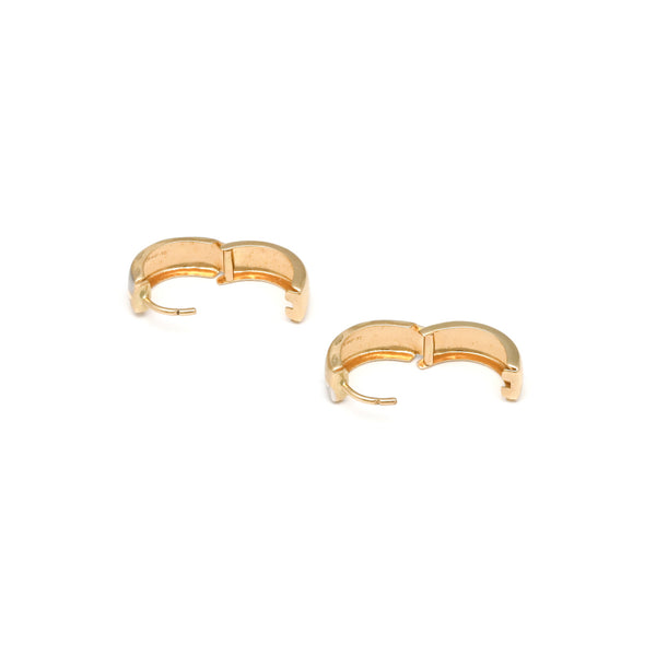 Arracadas articuladas en oro amarillo 14 kilates.