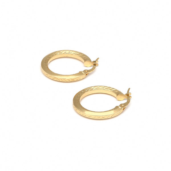 Arracadas facetas en oro amarillo 14 kilates.