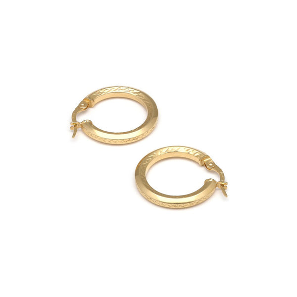 Arracadas facetas en oro amarillo 14 kilates.