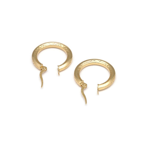 Arracadas facetas en oro amarillo 14 kilates.