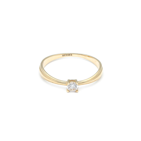 Anillo de compromiso con circonia en oro amarillo 14 kilates.