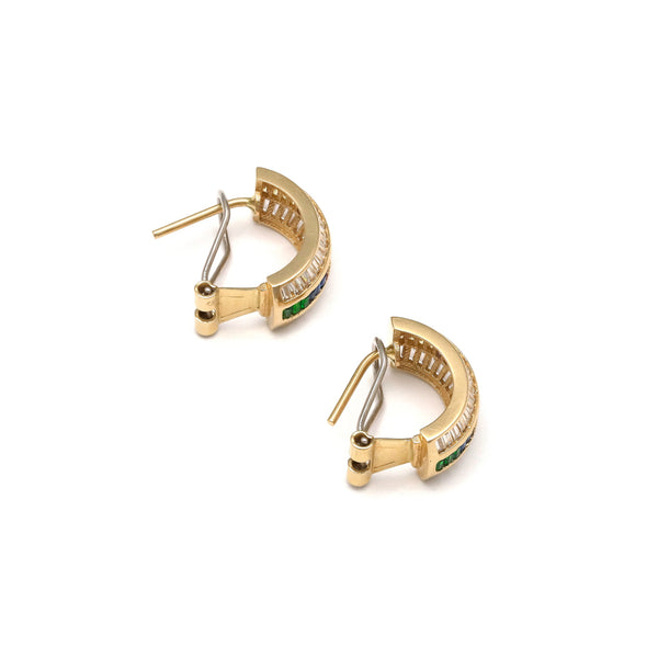 Aretes diseño especial con circonias en oro amarillo 14 kilates.