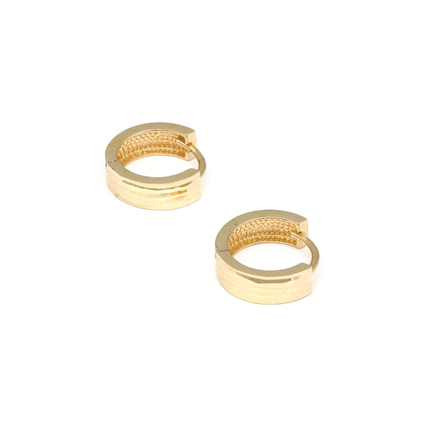 Arracadas articuladas en oro amarillo 14 kilates.