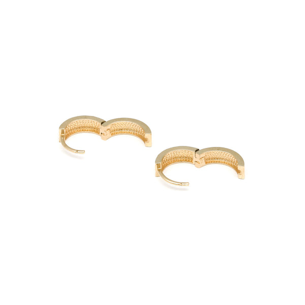 Arracadas articuladas en oro amarillo 14 kilates.