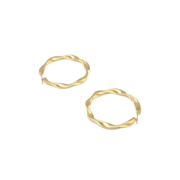 Arracadas torzal huecas en oro amarillo 14 kilates.