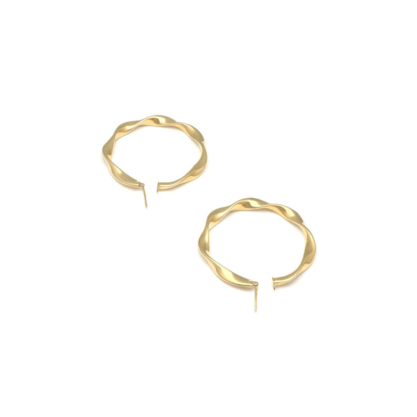 Arracadas torzal huecas en oro amarillo 14 kilates.