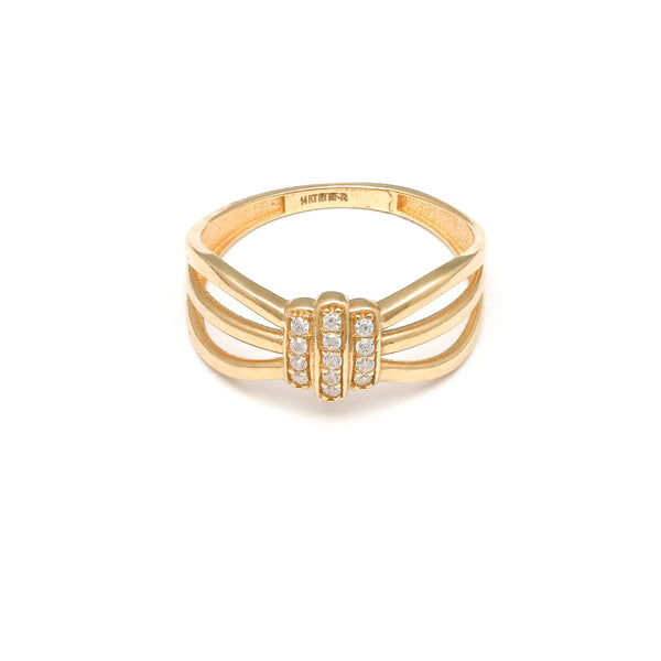Anillo diseño especial motivo nudo con circonias en oro amarillo 14 kilates.