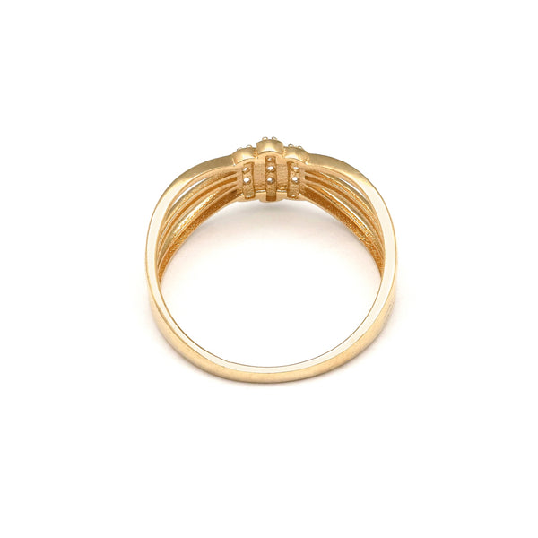 Anillo diseño especial motivo nudo con circonias en oro amarillo 14 kilates.