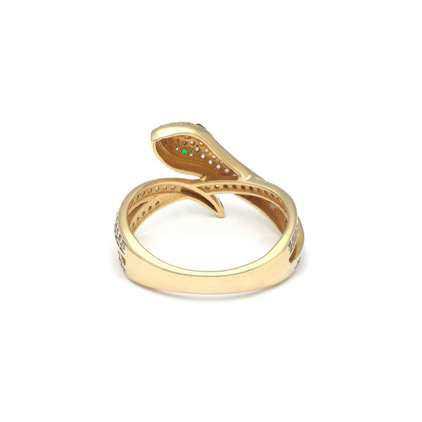 Anillo diseño especial motivo víbora con sintéticos en oro amarillo 14 kilates.