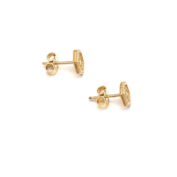 Aretes diseño especial motivo hexágono con circonias en oro amarillo 14 kilates.