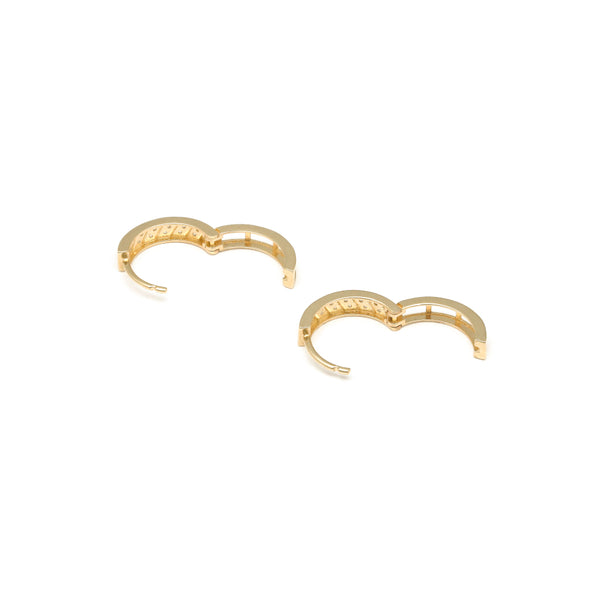 Arracadas caladas con circonias en oro amarillo 14 kilates.