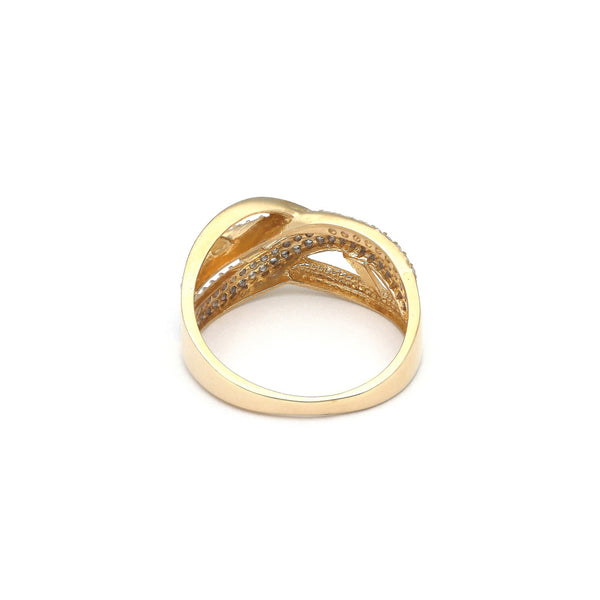 Anillo diseño especial con circonias en oro amarillo 14 kilates.