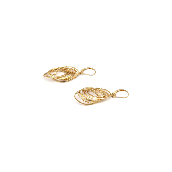 Aretes huecos con colgantes en oro amarillo 14 kilates.