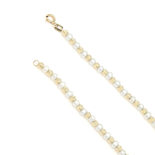 Pulsera eslabón boleado con sintéticos en oro amarillo 14 kilates.