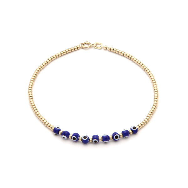 Pulsera eslabón boleado con aplicaciones motivo ojos de sintéticos en oro amarillo 14 kilates.