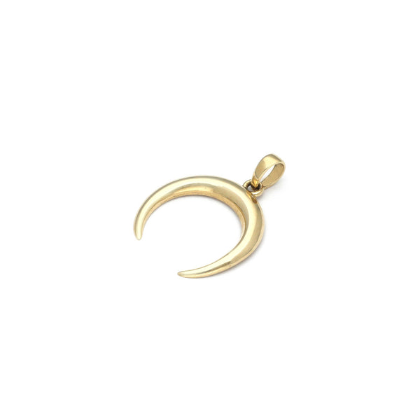 Dije diseño especial motivo luna en oro amarillo 14 kilates.