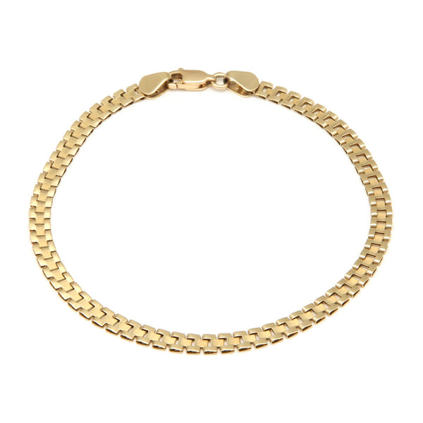 Pulsera eslabón articulado en oro amarillo 14 kilates.