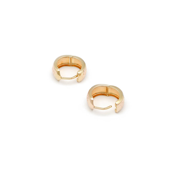 Arracadas articuladas en oro amarillo 14 kilates.
