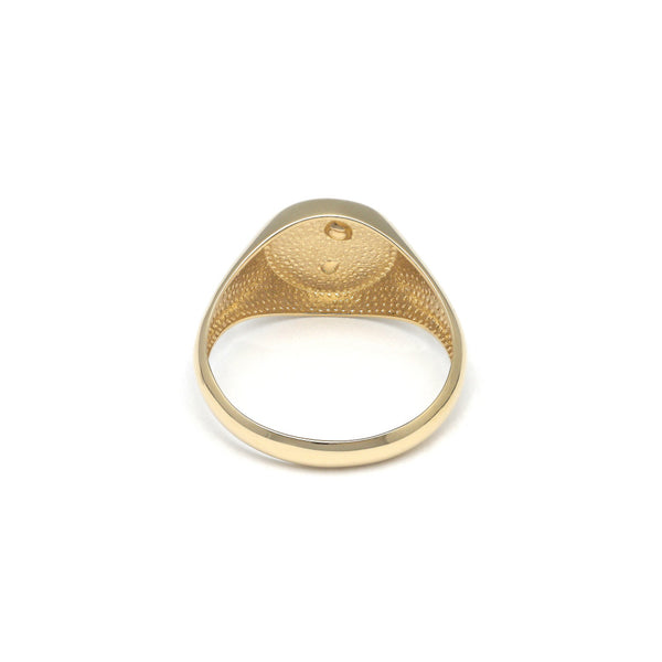 Anillo tipo sello en oro amarillo 14 kilates.