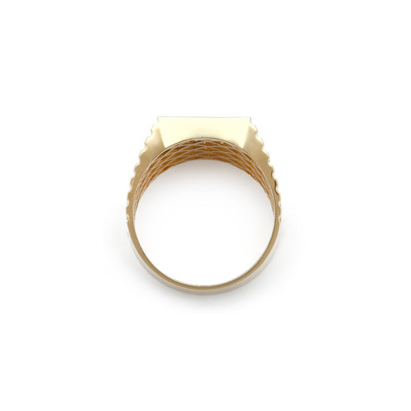 Anillo tipo sello con circonias en oro amarillo 14 kilates.