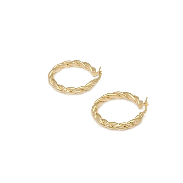 Arracadas torzal en oro amarillo 14 kilates.