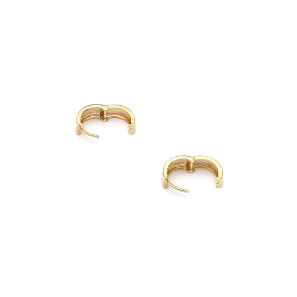 Arracadas articuladas en oro amarillo 14 kilates.