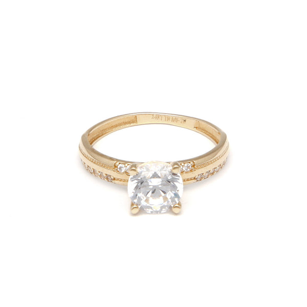 Anillo de compromiso con circonias en oro amarillo 14 kilates.