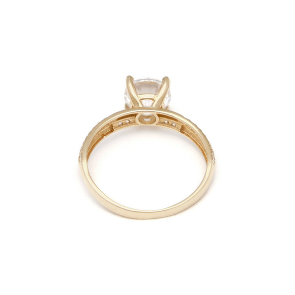 Anillo de compromiso con circonias en oro amarillo 14 kilates.