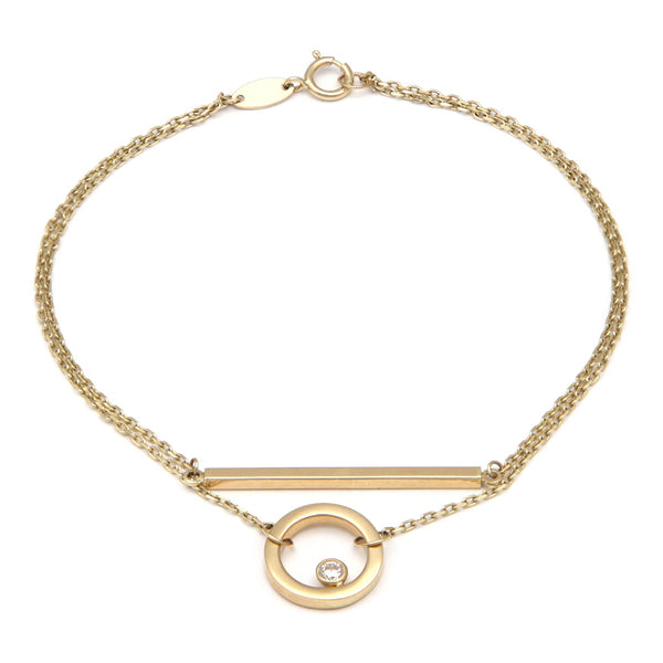Pulsera de dos hilos eslabón cruzado con aplicaciones y sintético en oro amarillo 14 kilates.