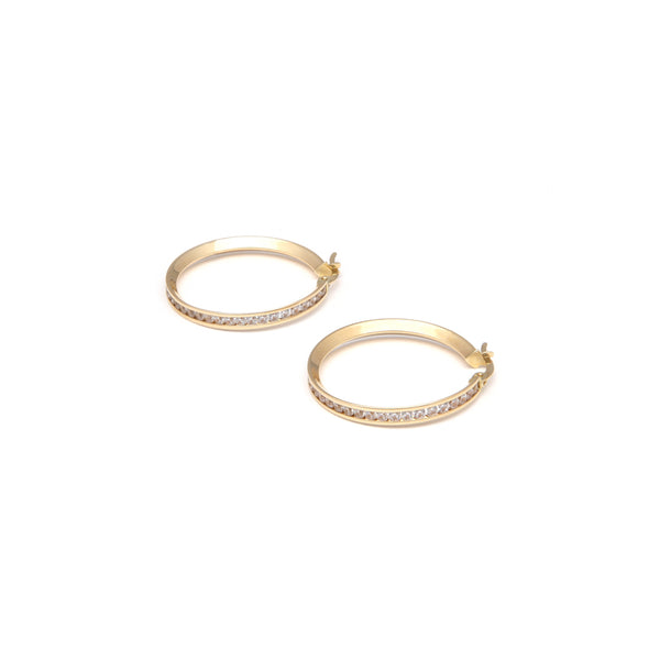 Arracadas diseño especial con circonias en oro amarillo 14 kilates.