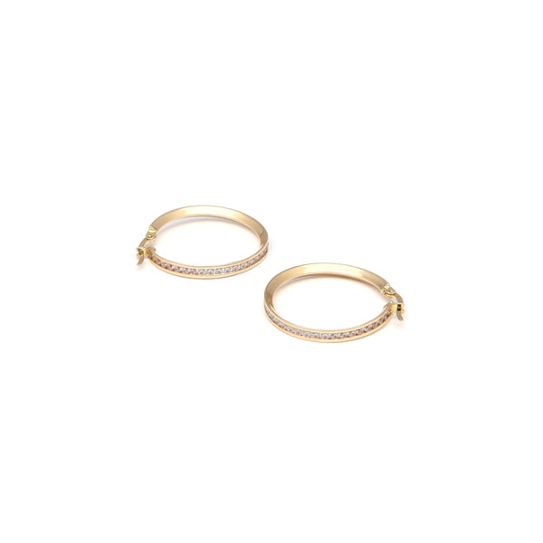 Arracadas diseño especial con circonias en oro amarillo 14 kilates.